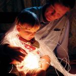 child with fiber optic lights