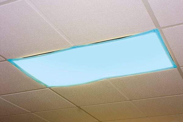 blue light filter covering a classroom fluorescent window