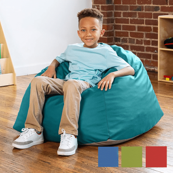 boy sitting in a gumdrop beanbag chair