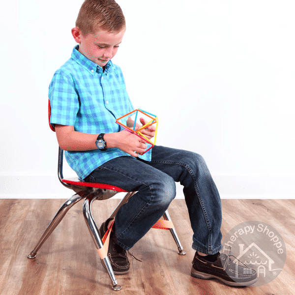 student in a chair using a fidgeting foot band