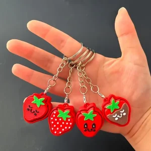 strawberry fidget clicker keychain