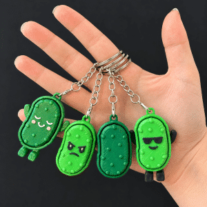 These fun pickle clicker keychains are a tasty twist on stress relief and sensory play! Each 3D-printed pickle features a satisfying clickable button that provides calming tactile feedback while keeping hands busy.